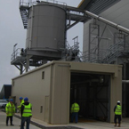 Truck Loading Sludge System:
The silo is fed by a number of conveyors from inside the building, the silo is a sliding frame silo which feeds a truck loading conveyor.
The truck loading conveyor has a number of automatically operated outlet positions in order to get an even distribution in the truck.
